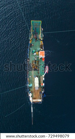 An aerial view of a commercial engineering diving ship doing work on the ocean floor.  Atlantic Ocean, Ireland. Donegal Bay.