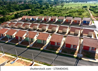 Aerial view of community houses in construction. Panoramic view of popular housing. Great landscape. Popular houses. Community housing. Construction landscape. Popular neightborhood houses. 