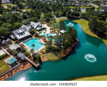 Aerial View Of Community Pool And Clubhouse