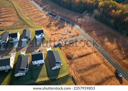 Aerial view of construction site with new tightly packed homes in South Carolina. Family houses as example of real estate development in american suburbs