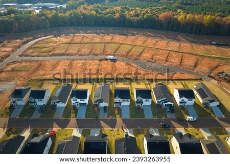 Aerial view of construction site with new tightly packed homes in South Carolina. Family houses as example of real estate development in american suburbs