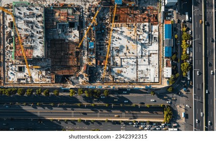 An aerial view of a construction site showing a new building in the process of being built - Powered by Shutterstock