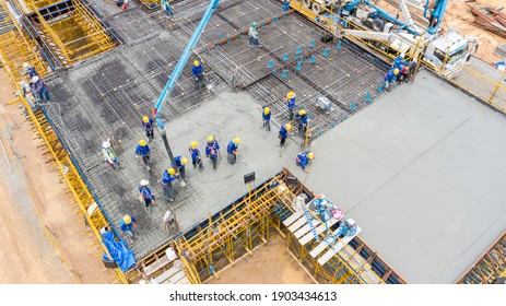 Aerial View Construction Worker Pouring Concrete Floor.