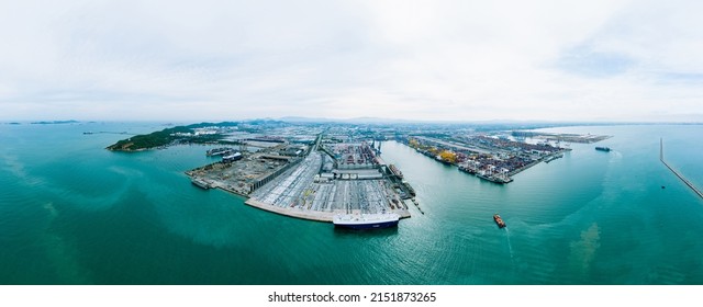 Aerial view container ship and ro-ro ship. Aerial view International Containers Cargo ship of Loading big vessel in the port of Laem Chabang terminal, Container Crane, Unloading Containers.