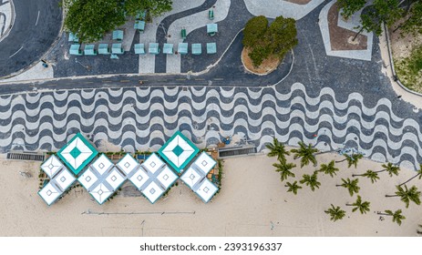 Aerial view of Copacabana, kiosk and coconut trees.