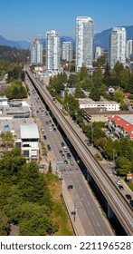 Aerial View Of Coquitlam Skyline And Residential Apartment Buildings. Taken In Greater Vancouver, British Columbia, Canada. Travel Photo, Nobody-October 1,2022. Vertical Photo