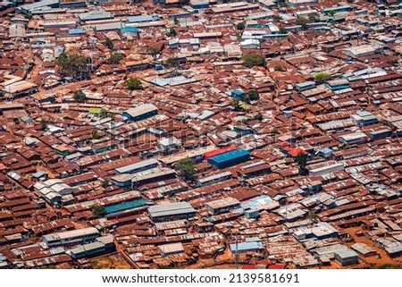 Aerial view of corrugated iron huts at the Nairobi downtown Kibera slum neighborhood, Nairobi, Kenya, East Africa, one of the largest slums in Africa