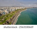 An aerial view of Lima’s Costa Verde reveals the perfect blend of urban life and natural beauty.With cliffs that kiss the Pacific and waves that call to surfers, this coastline is pure magic.