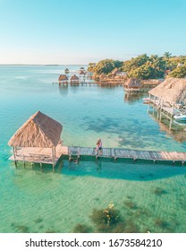 Aerial View Of A Couple In Bacalar Pier, Riviera Maya, Mexico