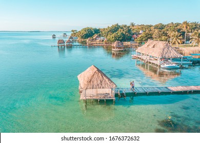 Aerial View Of A Couple In Bacalar Pier, Riviera Maya, Mexico