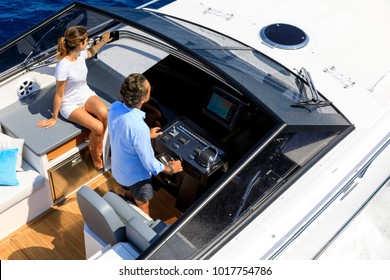 Aerial View Couple On Luxury Motor Boat