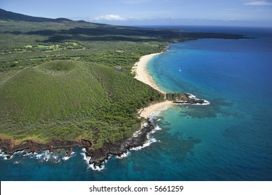 Aerial View Of Crater On Maui, Hawaii Coast With Beach.