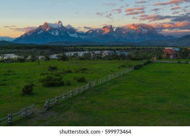 Aerial View Of The Cuernos And Torres Del Paine Inside The Torres Del Paine National Park In Chile At Sunrise.