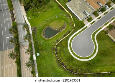 Aerial View Of Cul-de-sac At Neighborhood Street Dead End With Tightly Packed Homes In Florida Closed Living Clubs. Family Houses As Example Of Real Estate Development In American Suburbs