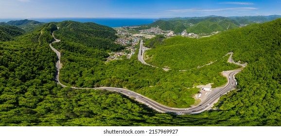 Aerial View Of A Curved Winding Road Trough The Caucasus Mountains