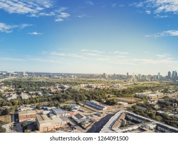 Aerial View Dallas Downtown Skylines From Trinity Groves. Top View Trinity River, The Ronald Kirk Footbridge And I-30 Highway From The West.