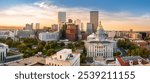 Aerial view of Denver, Colorado skyline and Colorado Capitol at sunset. Denver is a consolidated city and county, the capital, and most populous city of the U.S. state of Colorado