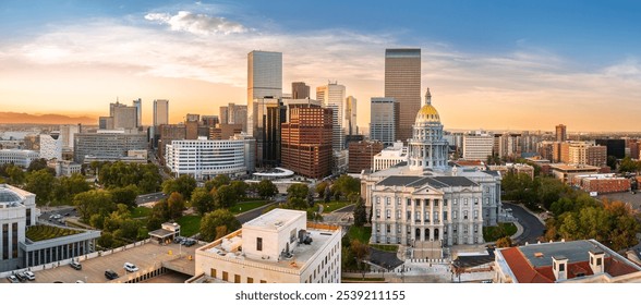 Aerial view of Denver, Colorado skyline and Colorado Capitol at sunset. Denver is a consolidated city and county, the capital, and most populous city of the U.S. state of Colorado