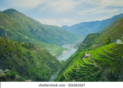 Aerial View To Desert Mountains With River And Lake