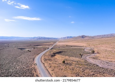 Aerial View Of A Dirt Road In The Arid Nevada Desert Near Reno In The Western USA.