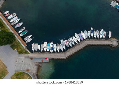 Aerial view of a dock with moored boats - Powered by Shutterstock