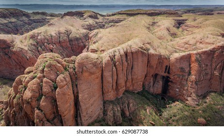 Aerial View Of Domes Near Entrance Of Echidna Chasm, Bungle Bungles During Wet Season. A Bushfire Recently Swept The Area. Earlier Heavy Rains Created Stunning Green Re-growth And Intensified Colours.