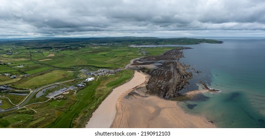 An aerial view of Doughmore Bay and Beach with the Trump International Golf Club hotel and golf course