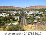 Aerial view of downtown Alice Springs from Anzac Hill with MacDonnell Ranges and Heavitree Gap in the background, Central Australia, Northern Territory