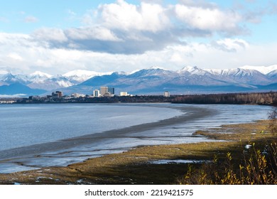 Aerial View Downtown Anchorage Alaska With Cook Inlet, Turnagain Arm  And Snow Cap Chugach Mountain In Background. Coastal Trail With High-rise Buildings Skyscraper From Kincaid Park