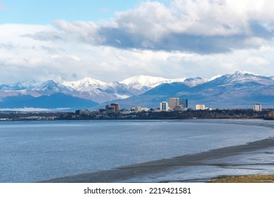 Aerial View Downtown Anchorage Alaska With Cook Inlet, Turnagain Arm  And Snow Cap Chugach Mountain In Background. Coastal Trail With High-rise Buildings Skyscraper From Kincaid Park