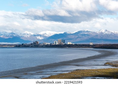 Aerial View Downtown Anchorage Alaska With Cook Inlet, Turnagain Arm  And Snow Cap Chugach Mountain In Background. Coastal Trail With High-rise Buildings Skyscraper From Kincaid Park