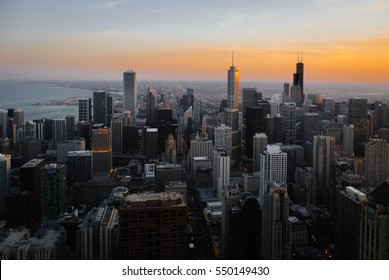 Aerial view of downtown Chicago at dusk, looking South.