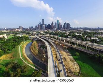 Aerial View Downtown And Interstate I45 Highway With Massive Intersection, Stack Interchange, Road Junction Overpass And Elevated Road Construction At Sunset From Northwest Side Of Houston, Texas, USA