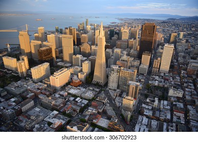 an aerial view of downtown san francisco during sunset