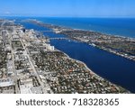 Aerial view of downtown West Palm Beach, Florida, the Lake Worth lagoon, and the island of Palm Beach.