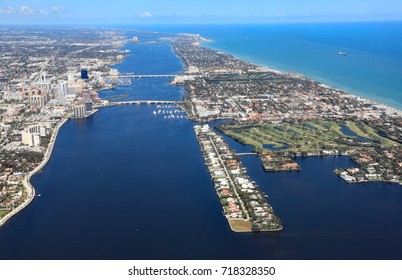 Aerial View Of Downtown West Palm Beach, Florida, The Lake Worth Lagoon, And The Island Of Palm Beach.