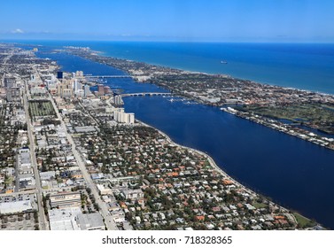 Aerial View Of Downtown West Palm Beach, Florida, The Lake Worth Lagoon, And The Island Of Palm Beach.