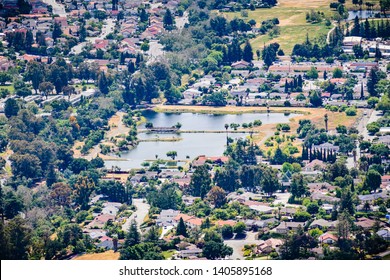 Aerial View Of Dr. Robert Gross Groundwater Recharge Pond Surrounded By A Residential Neighborhood, San Jose, South San Francisco Bay Area