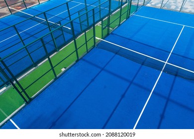 Aerial view with drone, overhead shot of a paddle tennis courts. Racket sports concept
