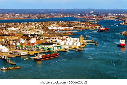 Aerial view of Dry Dock and Repair and Port Newark and Global international shipping containers, Bayonne, New Jersey. NJ, USA. Harbor cargo. Staten Island with St George Ferry terminal. Mixed media.
