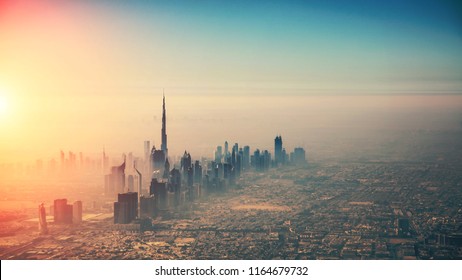 Aerial view of Dubai city in sunset light. Panoramic view. Dubai is the biggest and most modern city in UAE.