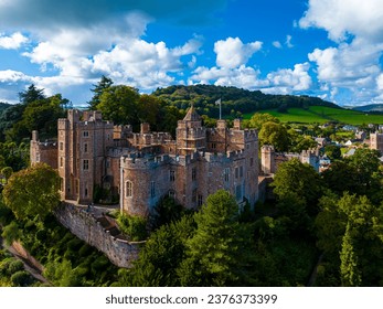 Aerial view of Dunster Castle in the village of Dunster, Somerset, England