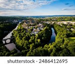 Aerial View of Durham City England, Drone point of view, Historic Durham Cathedral sits on a hill in the sunshine, surrounded by the River Wear. 