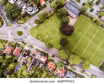 Aerial view of Dutch town, builidings, park, roundabout