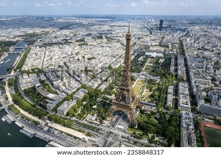 Aerial view of the Eiffel Tower and Champ de Mars in Paris, France.