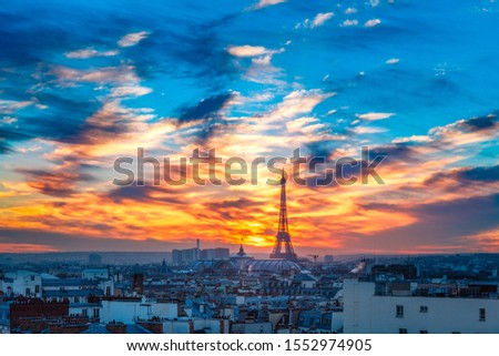 Similar – View of Paris with Eiffel tower silhouette at sunset