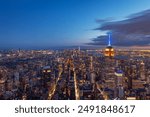 Aerial view of the Empire State Building and downtown Manhattan at dusk, New York City.