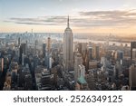 Aerial view of the Empire State Building and downtown Manhattan at dusk, New York City. 