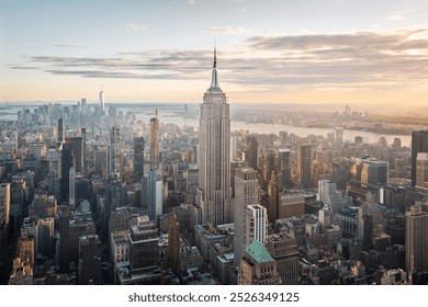 Aerial view of the Empire State Building and downtown Manhattan at dusk, New York City.  - Powered by Shutterstock