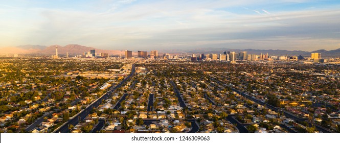 Aerial view of the entire length of Las Vegas Strip with surrounding homes and retail space